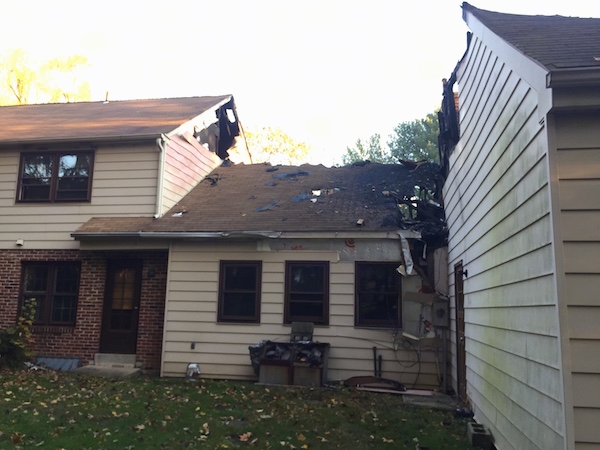 A house that burned down and the second floor gone.