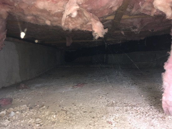 35 year old fiberglass insulation on the top of a crawl space in a farmhouse