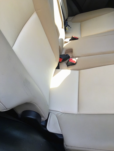 The back row of seats in a car